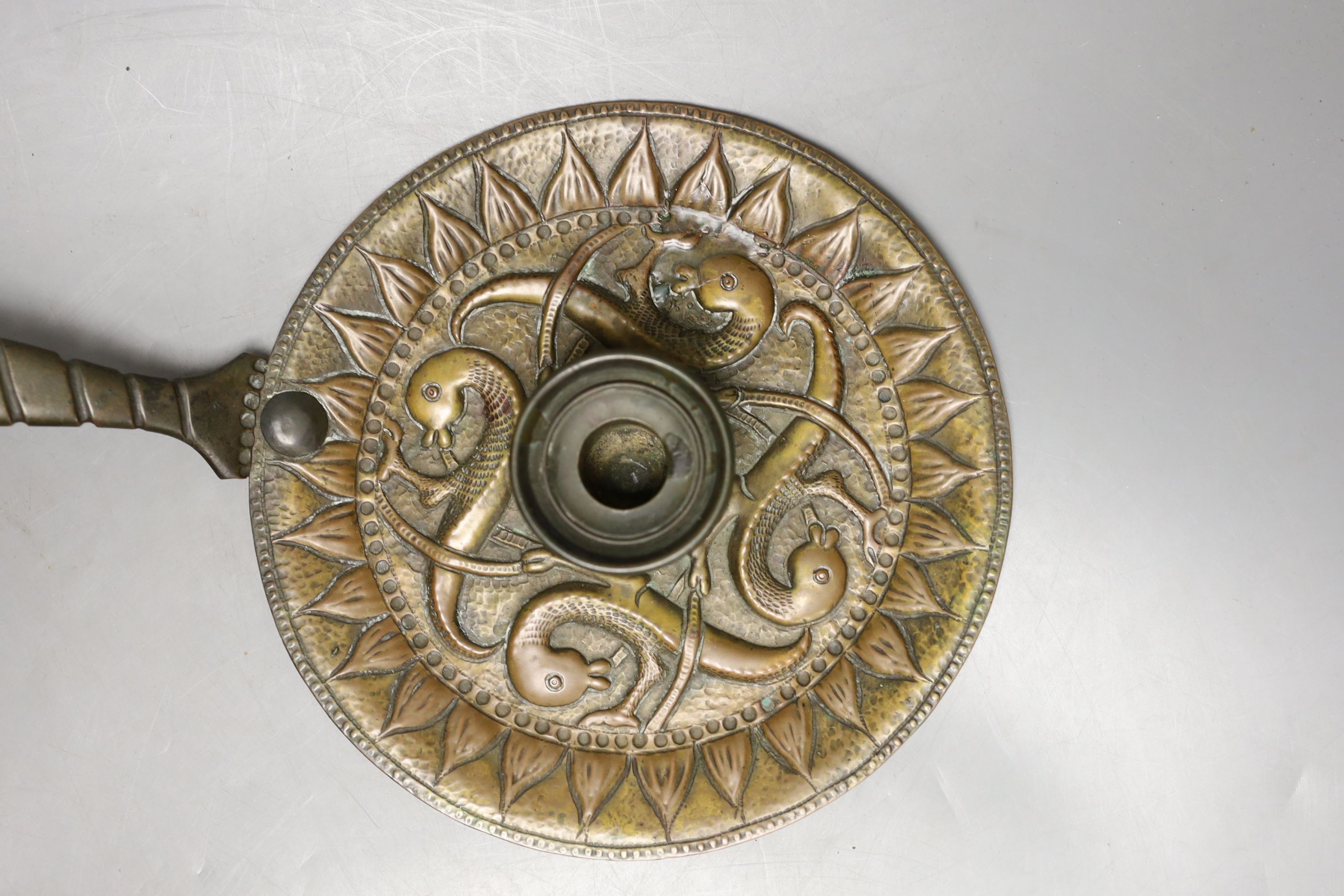 John Pearson (1859-1930) - an Arts & Crafts copper and brass chamberstick, length 33.5cm